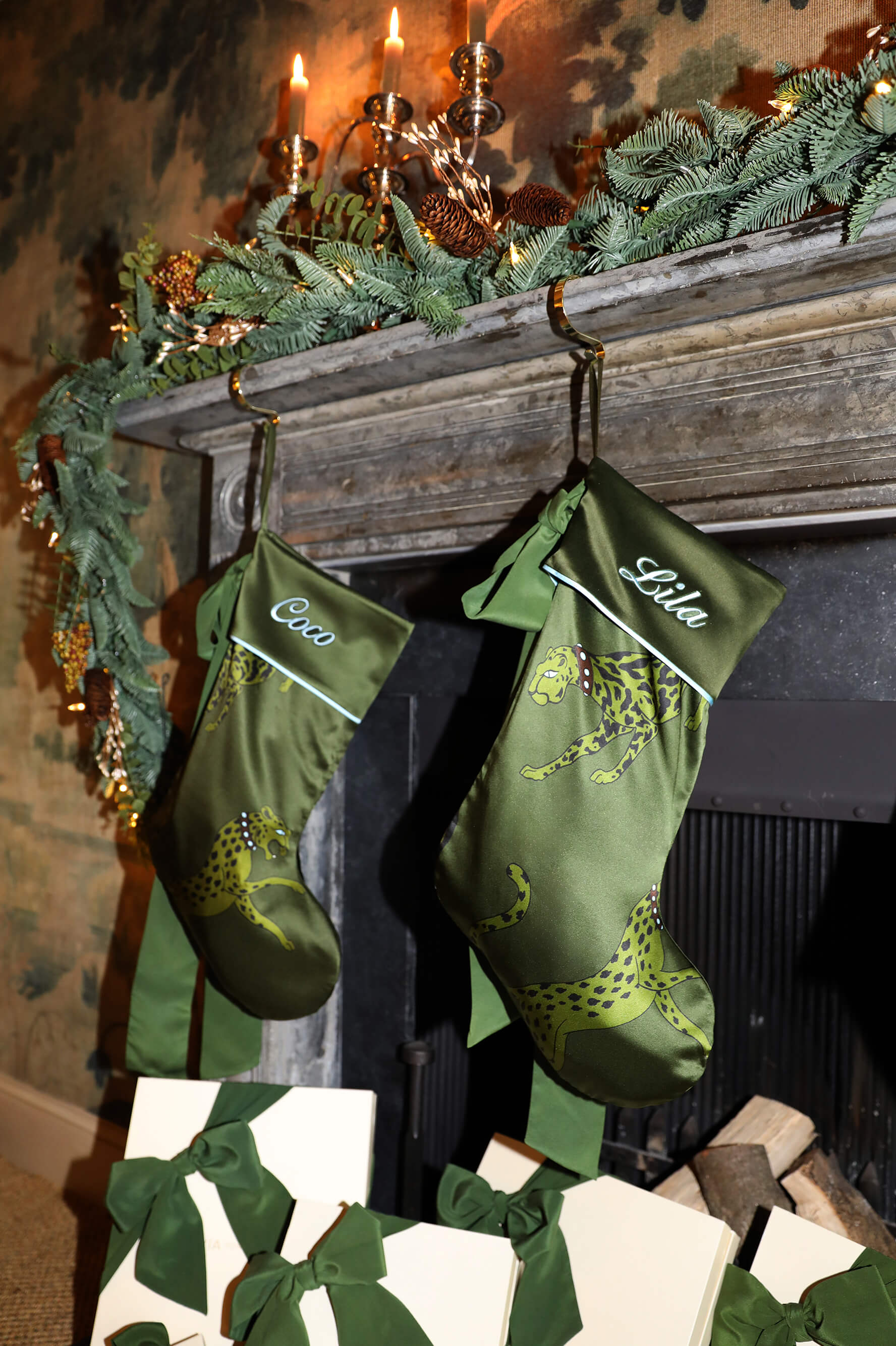 green christmas stocking with a bow and leopard print 